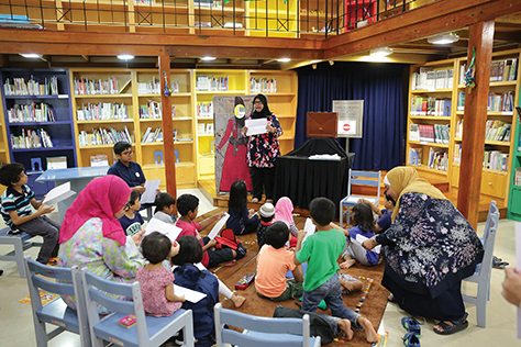 6. Children mesmerised by a storytelling session held at the IAMM Children's Library.